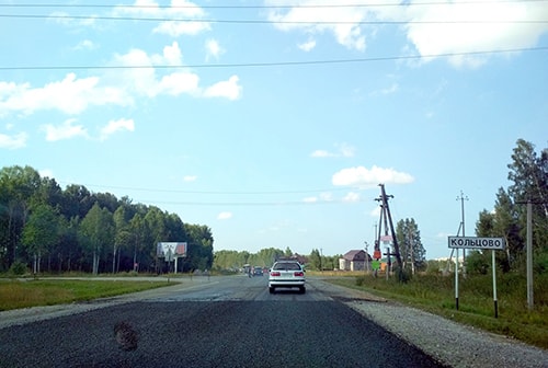 На трассе «Академгородок – Кольцово» укладывают защитный слой (фото)
